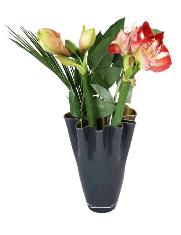 Breng sfeer en gezelligheid in je interieur met bloemen en mooie vazen