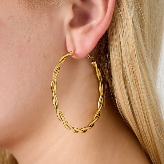 Fijne gedraaide oorringen in roestvrij staal - goudkleurig