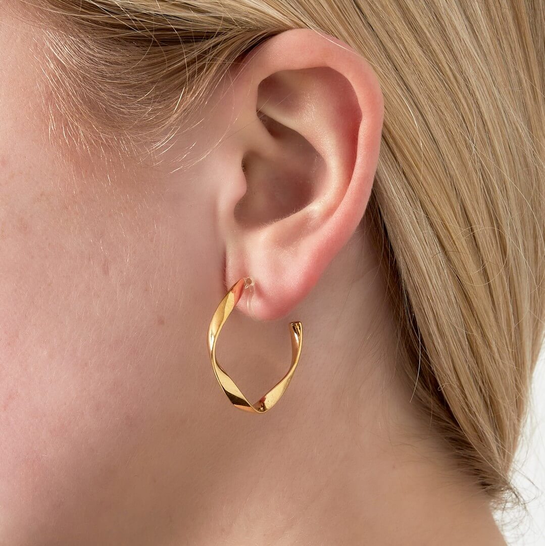 Gebogen Clip Oorbellen - roestvrijstaal - goudkleurig en zilvekleurig