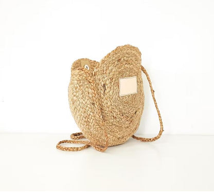 The Code Spain Ronde Schoudertas met beige voorvakje staand